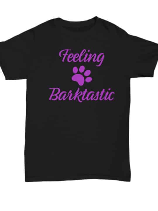 Tshirt has a paw print and says Feeling Barktastic