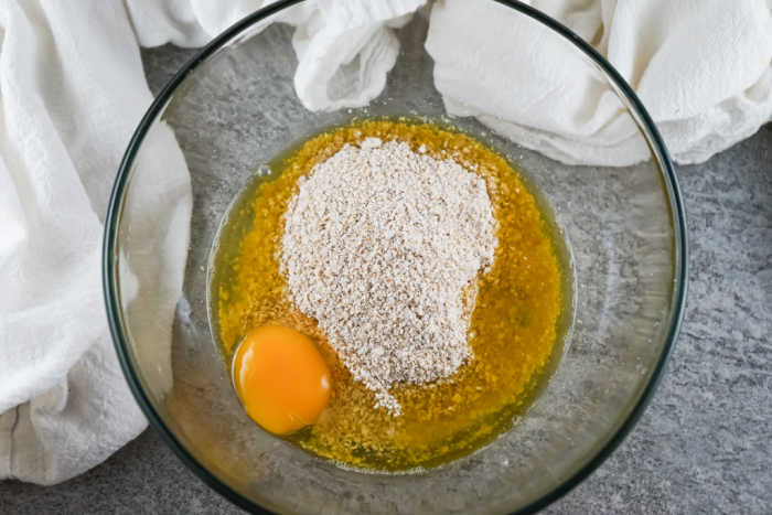 egg, oats and oil in bowl