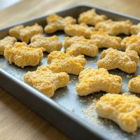 Cheesy Apple Dog Treats on baking pan.